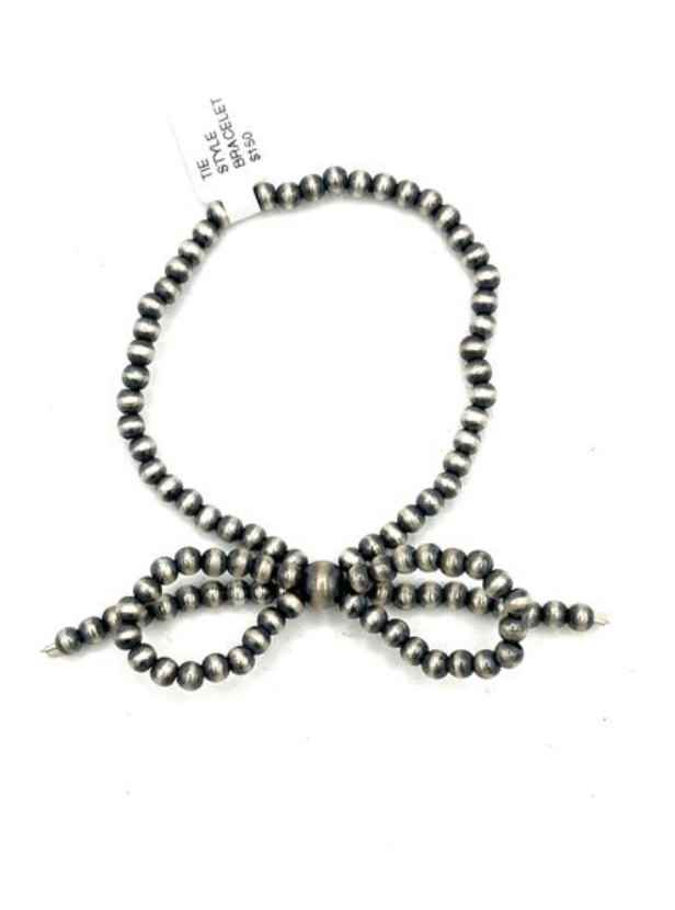 Sterling Silver Strechy Bow Tie Style Bracelet