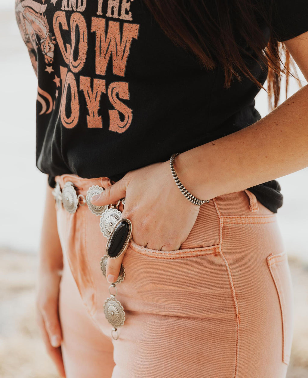 RAISIN HELL WITH THE HIPPIES & THE COWBOYS GRAPHIC TOP - BLACK